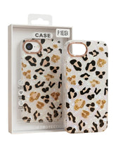 OBtech premium cheetah print phone case with gold glitter accents and protective packaging on a wooden surface