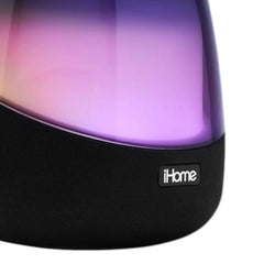 OBtech iHome iAV5 Bluetooth speaker with a glowing purple and pink LED light dome and black fabric base.