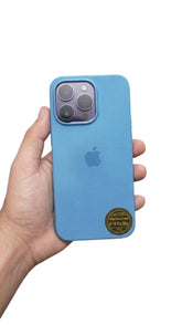 OBtech light blue smooth plastic back case for iPhone 14 Pro Max held in a hand showing camera protection