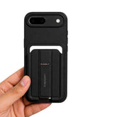 OBtech Spigen black iPhone case with a built-in foldable kickstand held in a hand against a white background.