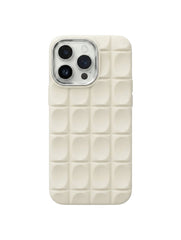 OBtech cream silicone iPhone case with a 3D square grid pattern and a polished metallic camera lens protector.