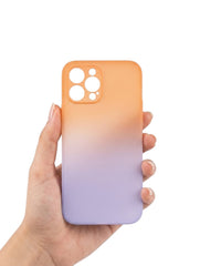 OBtech iPhone 11 dual tone case in orange and purple gradient held in a hand against a white background