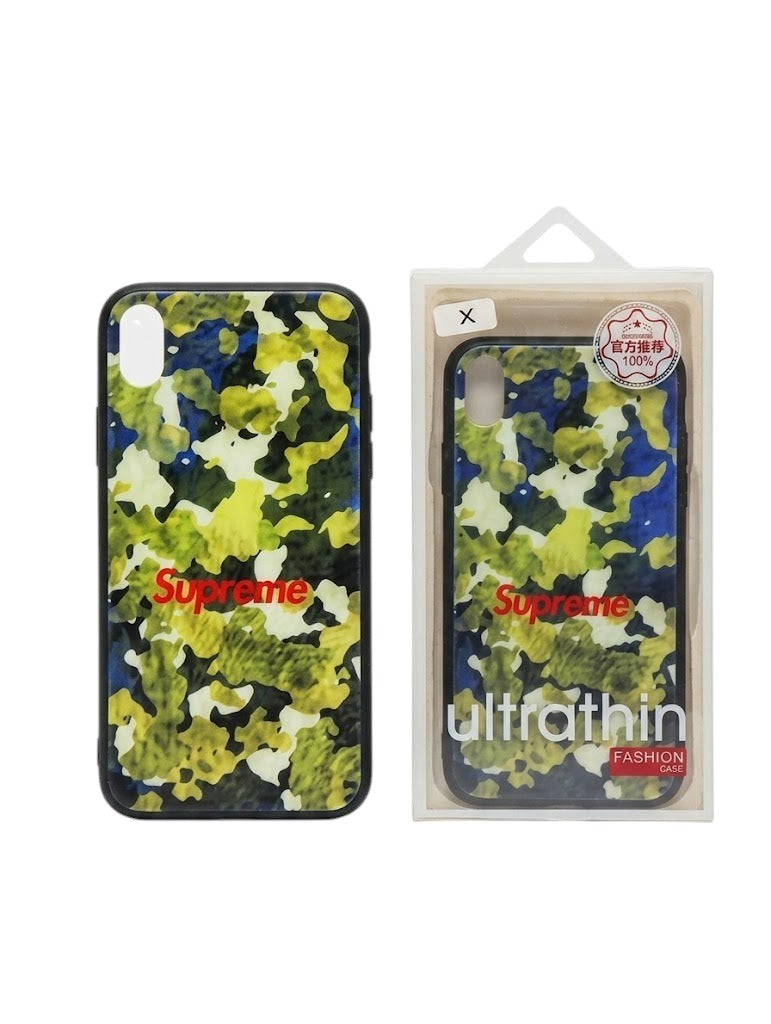 OBtech iPhone Supreme Design Cover featuring a vibrant yellow, blue, and green camouflage pattern with red logo
