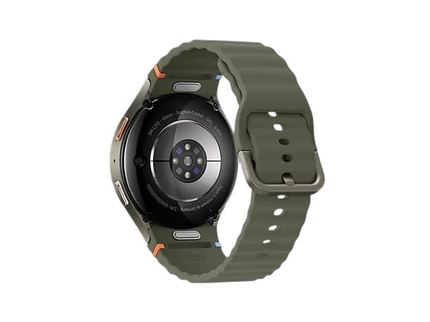 OBtech Samsung Galaxy Watch7 44mm showing the green silicone strap and rear health sensor array on the aluminum case.