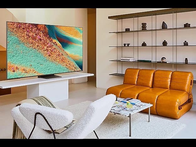 OBtech 75-inch Samsung Neo QLED 4K smart TV with ultra-slim bezels displayed in a modern living room setting.