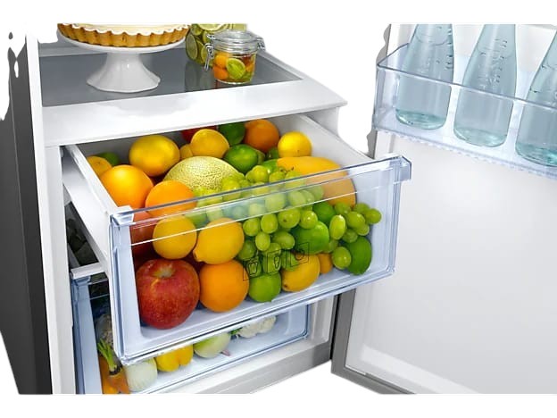 OBtech Samsung 375L refrigerator interior showing a clear pull-out crisper drawer filled with fresh assorted fruits