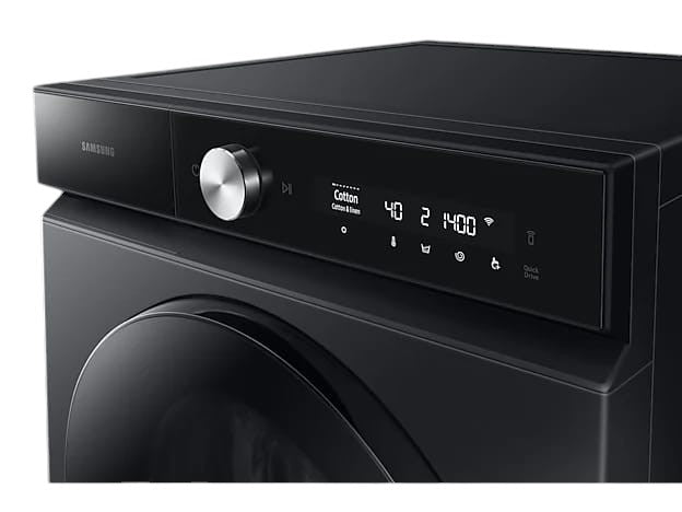 OBtech Samsung AI washer dryer combo featuring a sleek black finish, digital control panel, and metallic dial.