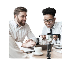 Two men recording a video interview using the OBtech Ven-Dens VD-MIC030 dual wireless microphone system on a smartphone